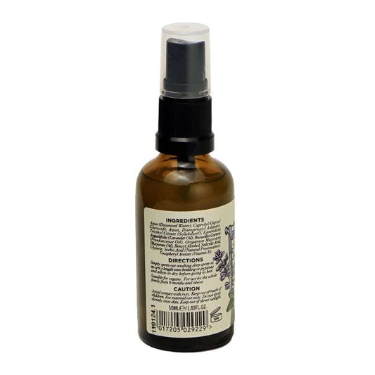 Brown spray bottle with label on a white background