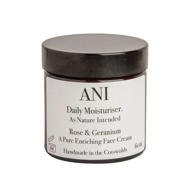Jar of ANI Daily Moisturiser with black lid on a white background