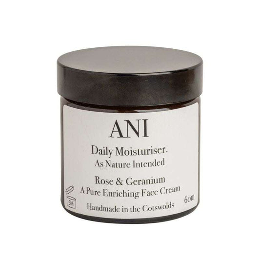 Jar of ANI Daily Moisturiser with black lid on a white background