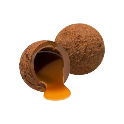 Chocolate truffle with a shell that has been partially eaten, revealing a rich chocolate filling.