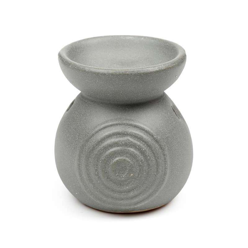 Gray ceramic oil burner with a textured design on a white background