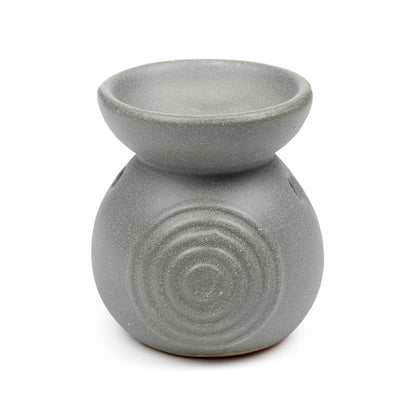 Gray ceramic oil burner with a textured design on a white background