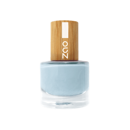 Bottle of Nail Polish (8ml) with light blue color and wooden cap featuring minimalistic design