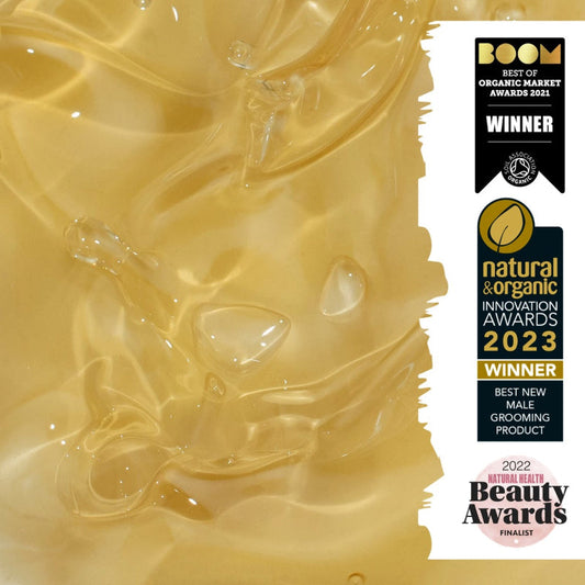 Gold product with awards on a white background