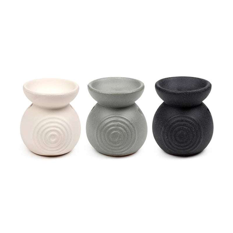 Set of three Spiral Ceramic Oil Burner/Wax Melter in white, gray, and black with ethical and sustainable design