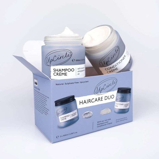 UpCircle haircare duo with shampoo and conditioner crème on a white background
