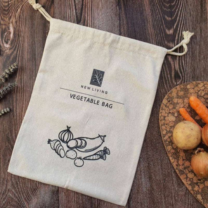 New Living vegetable bag on a wooden surface with vegetables around