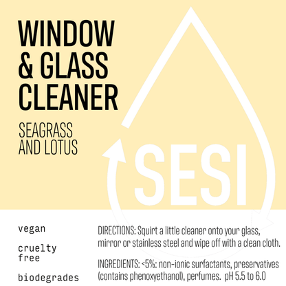 Label of a window and glass cleaner with sea grass and lotus scents, indicating the product is vegan, cruelty-free, and biodegradable.