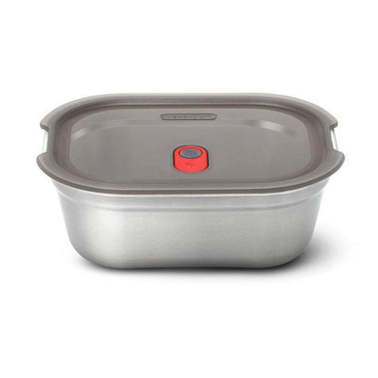 Stainless steel food container with a gray lid on a white background