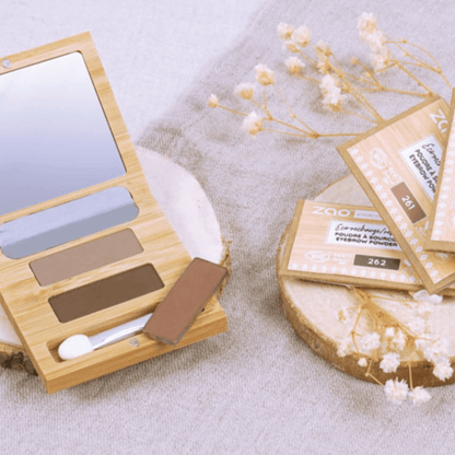 Eyebrow Powder ORGANIC (1.3g) makeup palette with shades and mirror on natural fabric background