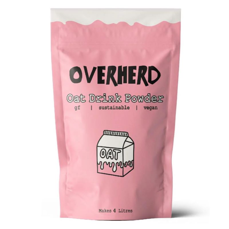 Pink packaging of Oat Milk Powder ORGANIC with sustainable, vegan, and gluten-free labels and a cartoon oat milk carton illustration