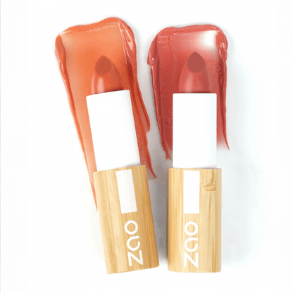 Two swatches of tinted balm with Colour + Plump Lip Balm (3.5g) in eco-friendly bamboo packaging on white background