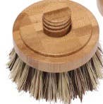 Wooden dish brush head with bristles on a white background
