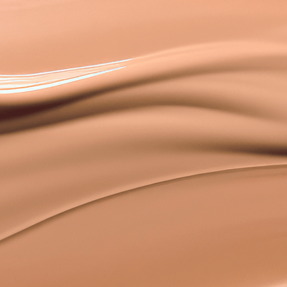 Close-up of smooth liquid texture in warm beige tones representing Second Skin Tinted ORGANIC Serums (30ml) natural skincare effect
