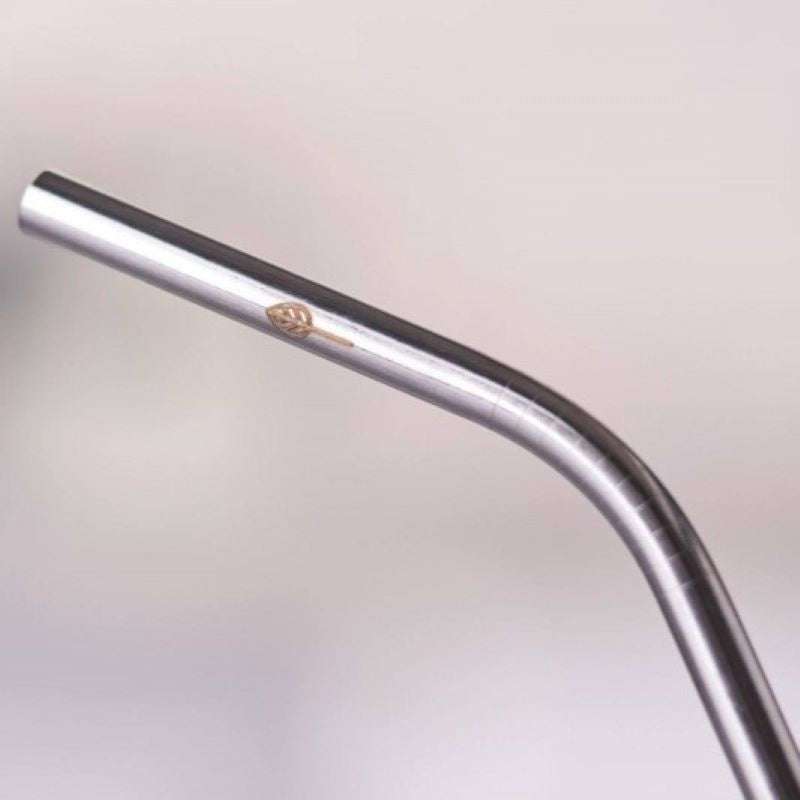 Close-up of a sleek Stainless Steel Drinking Straws (singles) with a gentle curve for easy sipping and eco-friendly use