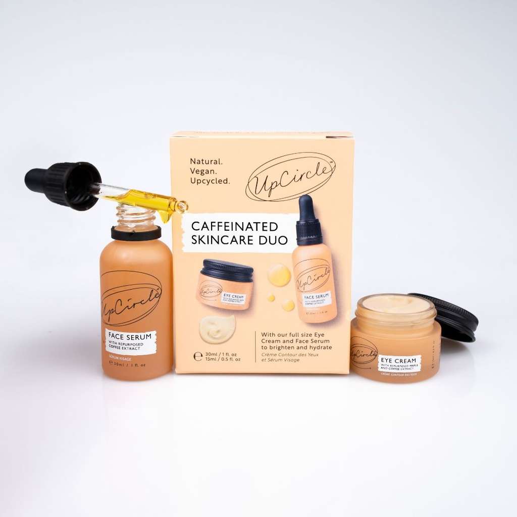 UpCircle skincare products including a serum, eye cream, and packaging on a white background