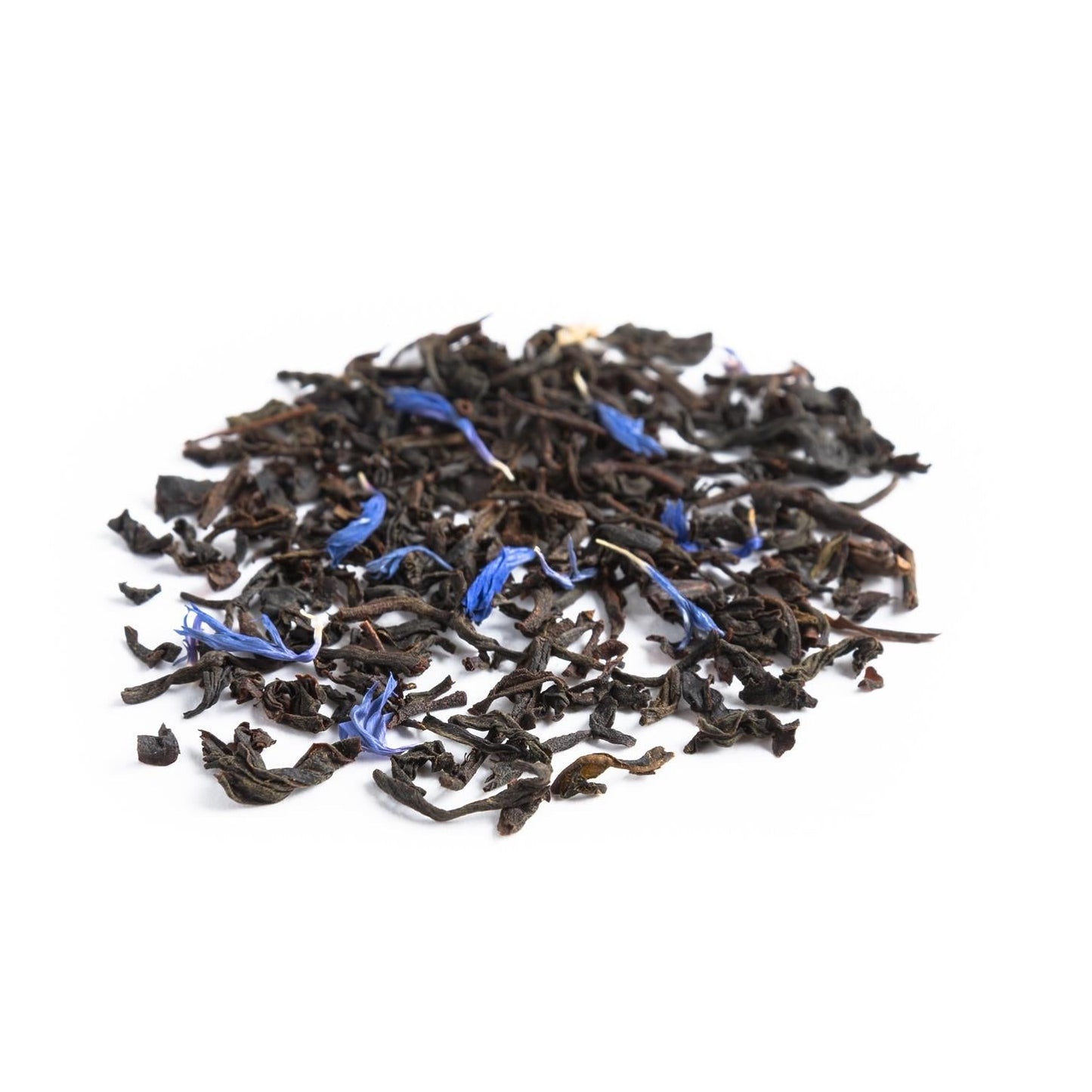A pile of loose leaf black tea with pieces of blue cornflower petals scattered throughout.