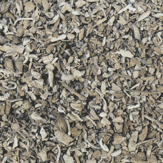Close-up of dried herbs and spices on a black background