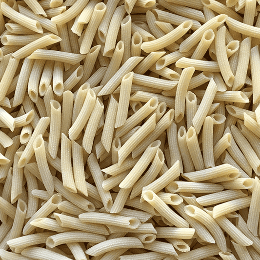 Close-up of uncooked penne pasta